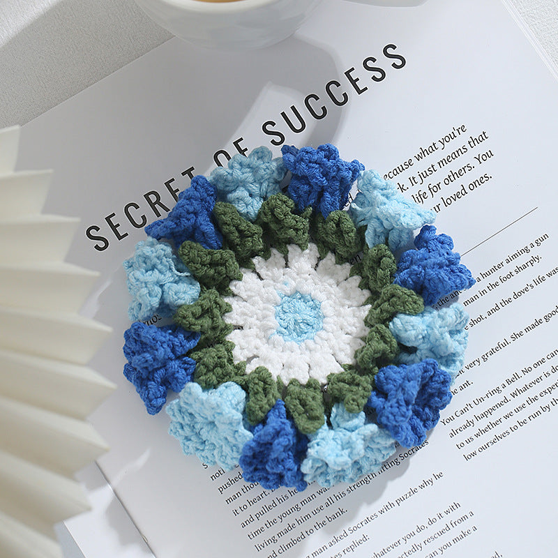 Hand-knitted Bell orchid coaster