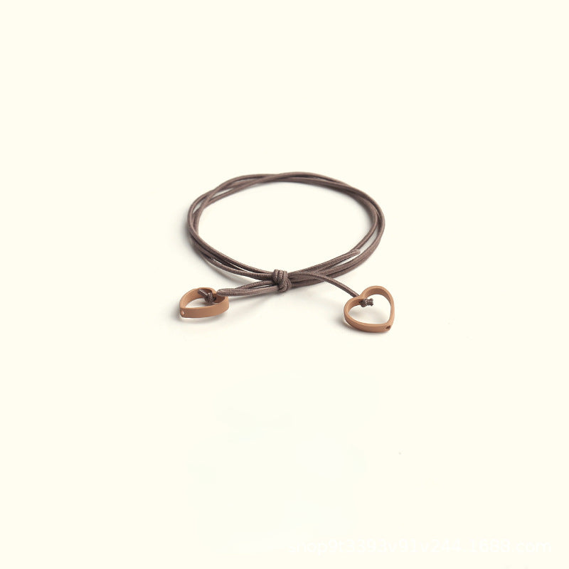 Elastic heart-shaped pendant hair tie