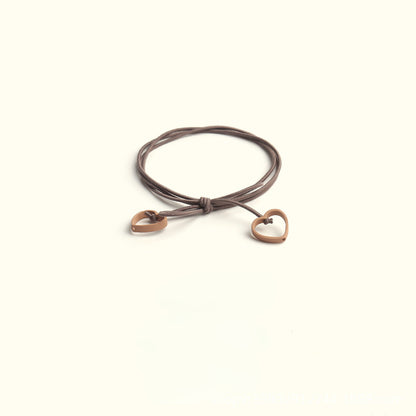 Elastic heart-shaped pendant hair tie