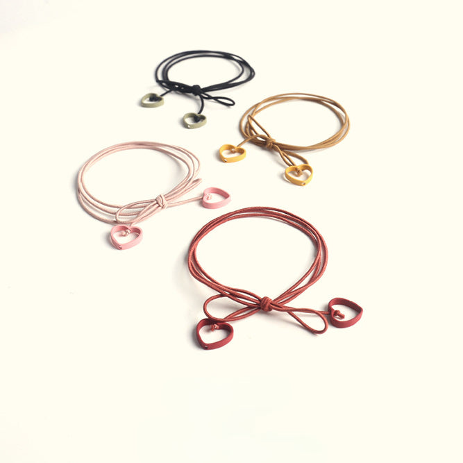 Elastic heart-shaped pendant hair tie