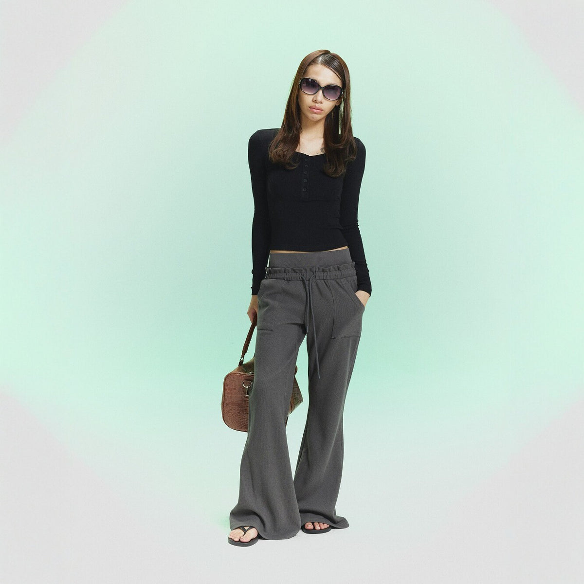 Pokiovo Low Rise Flared Trousers