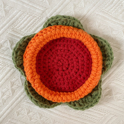 Hand-knitted Bell orchid coaster