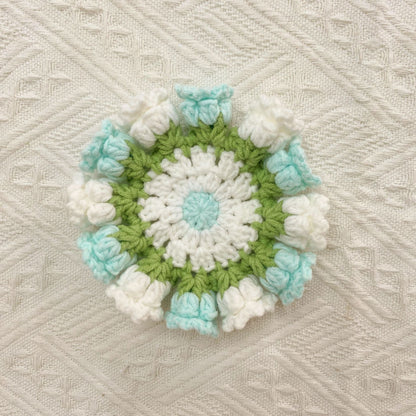 Hand-knitted Bell orchid coaster