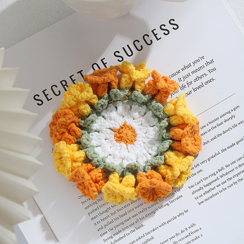 Hand-knitted Bell orchid coaster