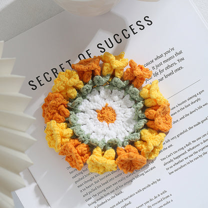 Hand-knitted Bell orchid coaster