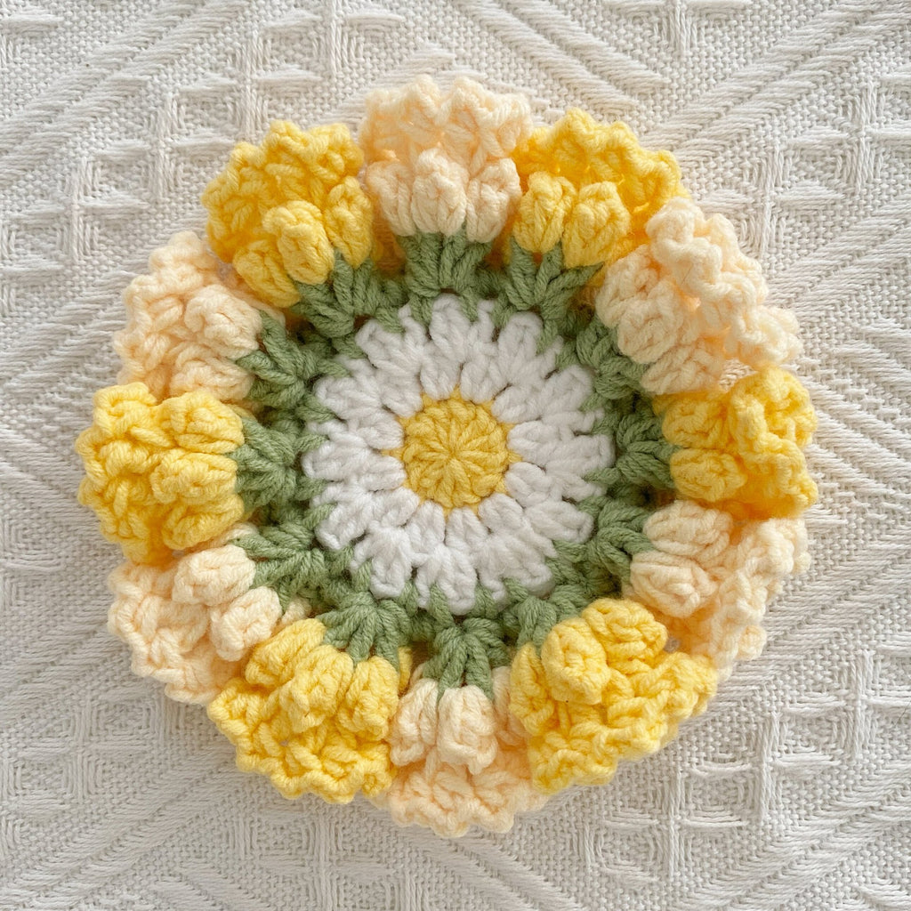 Hand-knitted Bell orchid coaster