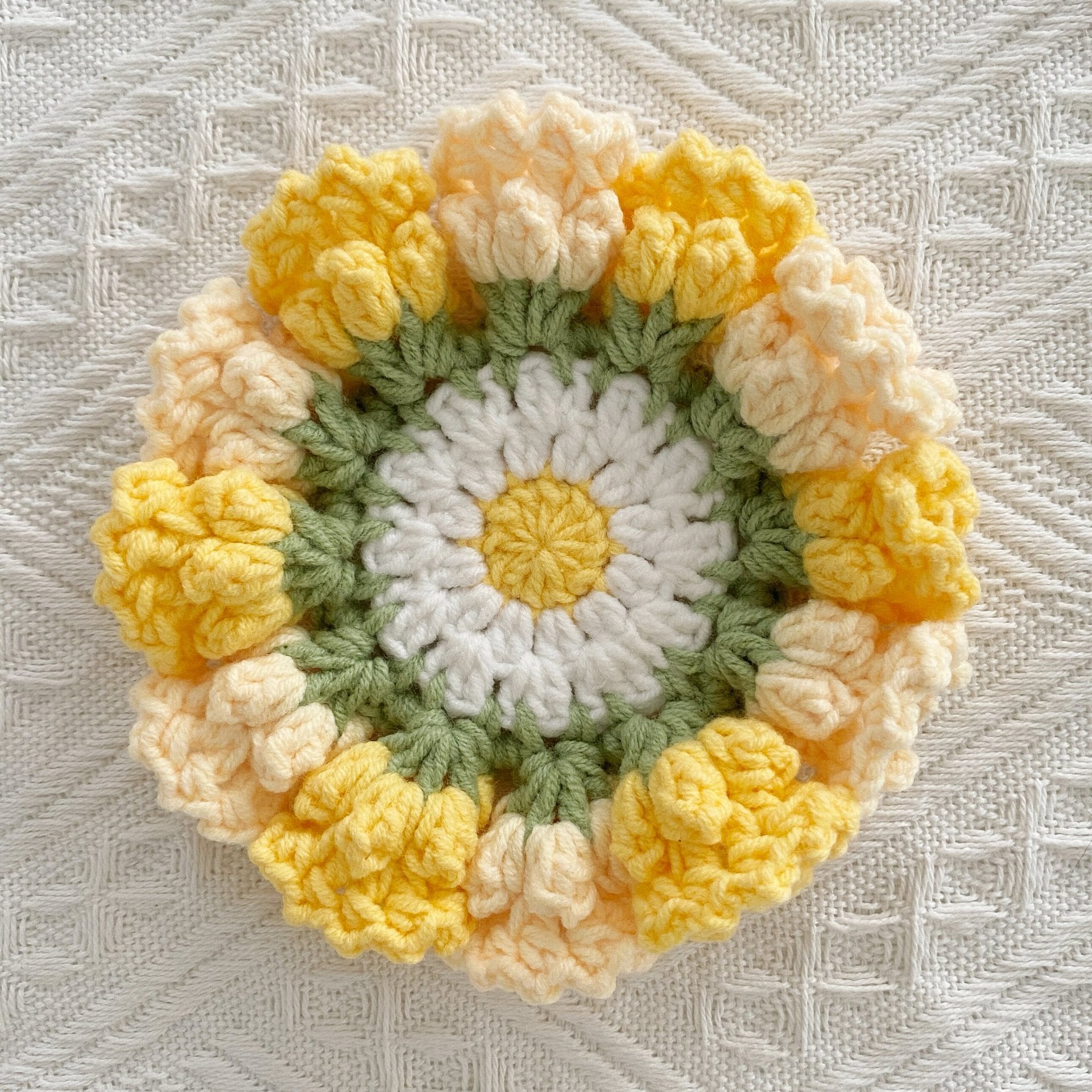 Hand-knitted Bell orchid coaster