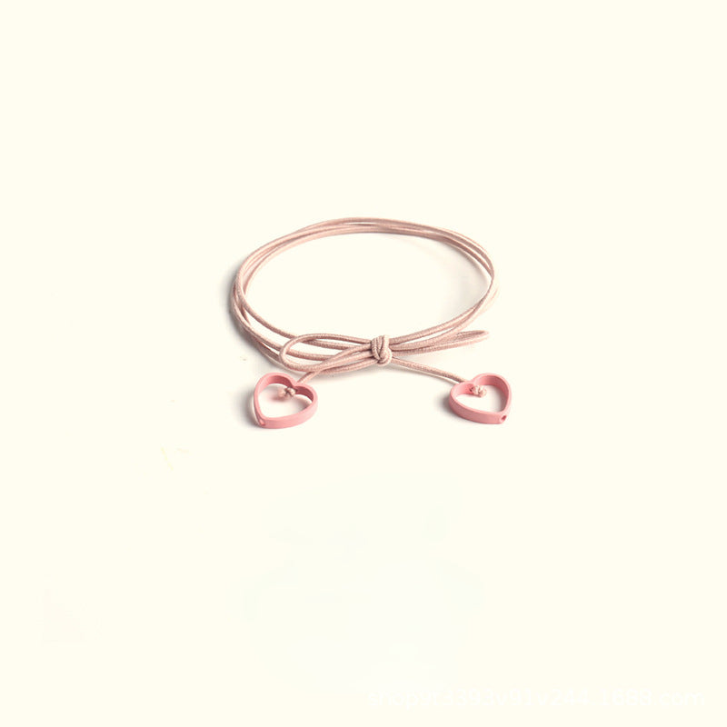 Elastic heart-shaped pendant hair tie