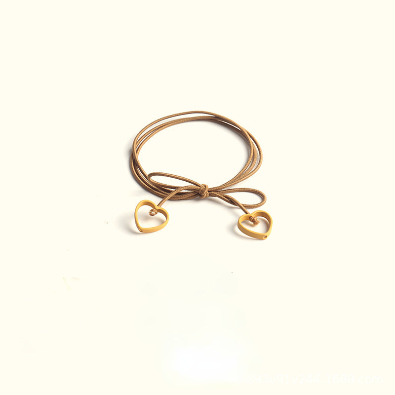 Elastic heart-shaped pendant hair tie